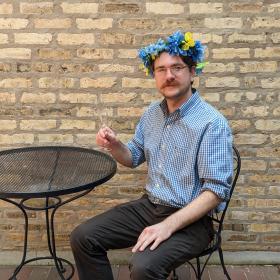 Jack wearing a blue and yellow flower crown